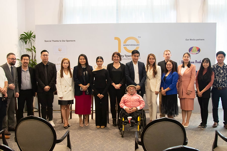 Guests pose for photo at Shanty Town Spirit's 10th anniversary press conference