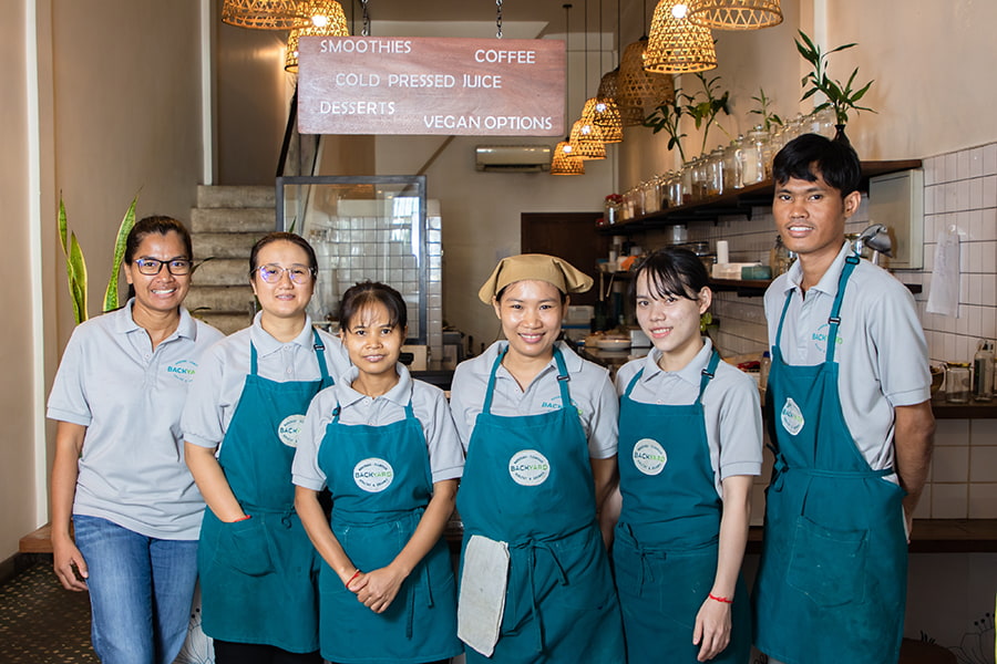Backyard Cafe staff pose for photo